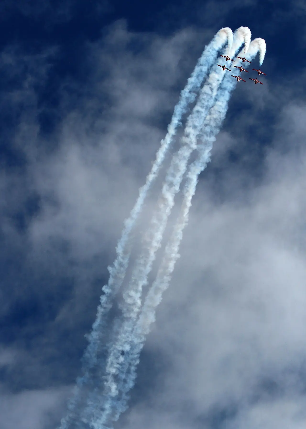 Snowbirds formation with smoke trails at the Tribute to Veterans Air Show, 2015