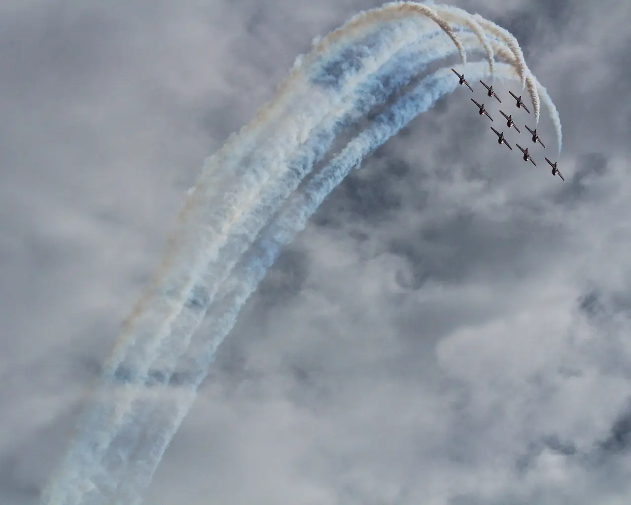 Snowbirds formation with smoke trails at the Tribute to Veterans Air Show, 2015